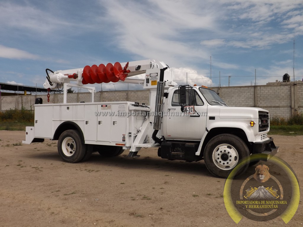 Camión GMC con Grúa y Taladro Digger Derrek Truck