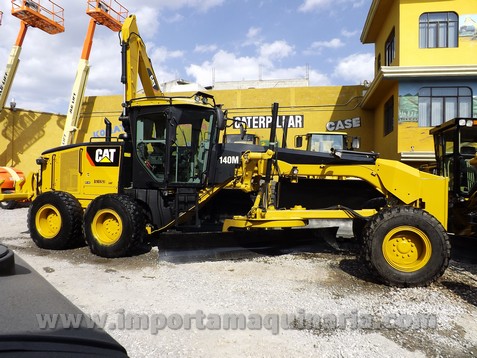 MOTOCONFORMADORA / MOTONIVELADORA CATERPILLAR 140M CABINA, RIPPER, PUSHBLOCK, CUCHILLA 14 FT.